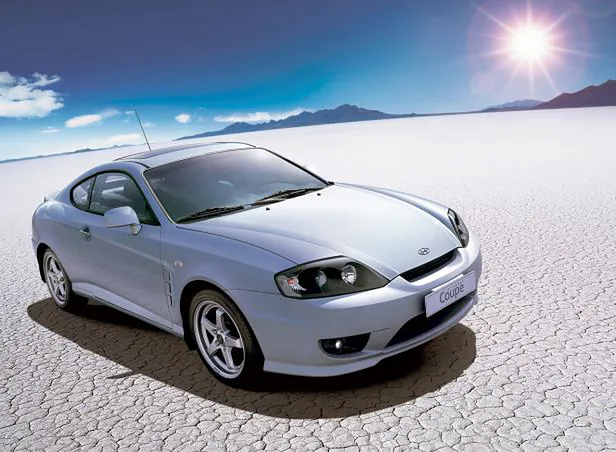 Hyundai Coupe i Tiburon (2002-2003) - schematy bezpieczników i przekaźników